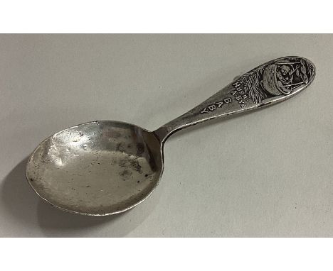 A silver caddy spoon depicting the nursery rhyme 'Hush-A-Bye Baby'. London 1947. Approx. 20 grams. Est. £20 - £30.