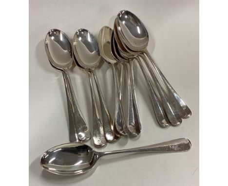 A set of twelve silver OE pattern spoons. Sheffield. By R&B. Approx. 326 grams. Est. £300 - £400.