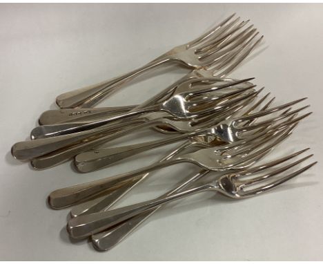 A set of twelve heavy silver OE pattern dessert forks. Sheffield. By R&B. Approx. 255 grams. Est. £300 - £400.