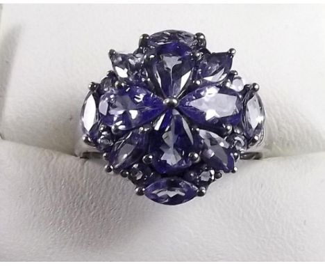 A silver tanzanite cluster ring 