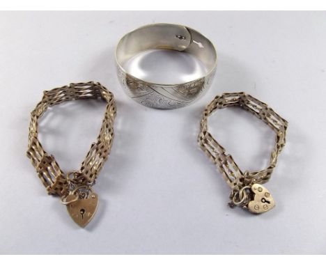 Two silver gate link bracelet and a silver bangle 