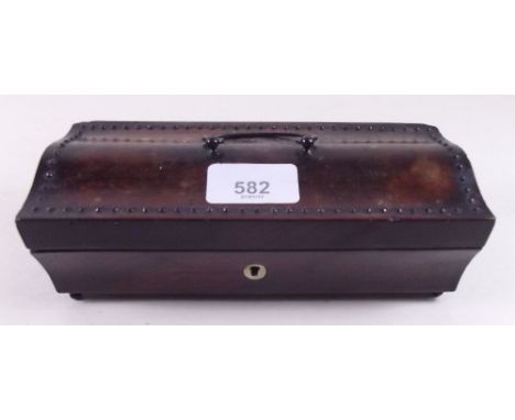 A Victorian mahogany trinket box with serpentine studded lid 