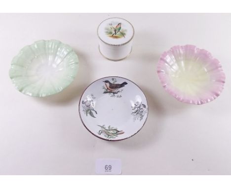 An early 19th century porcelain saucer printed and painted birds and flowers and a porcelain pot and lid painted bird and two