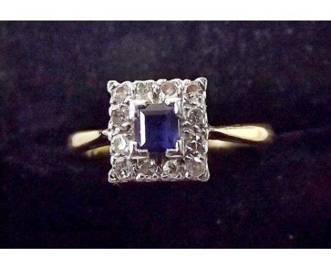 An 18ct gold square sapphire and diamond cluster ring 