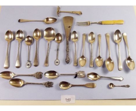 A box of various silver teaspoons, an Irish Georgian mustard spoon, pusher, fork etc.