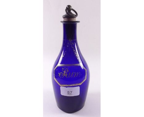An early 19th century Bristol Blue decanter with gilt 'Rum' label - chip to back of rim