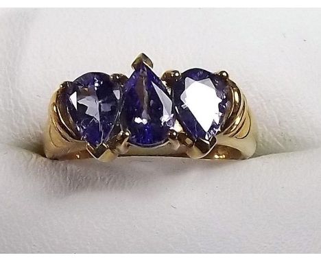 A 9ct gold three stone tanzanite ring 