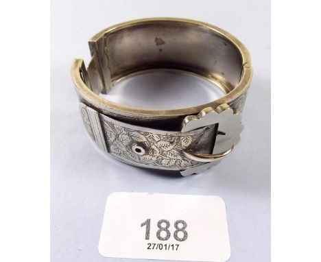 A Victorian silver engraved buckle form hinged bangle 