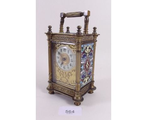 A French 19th century brass carriage clock by R & Co Paris, with pierced and chased front and enamelled side panels, 17cm tal