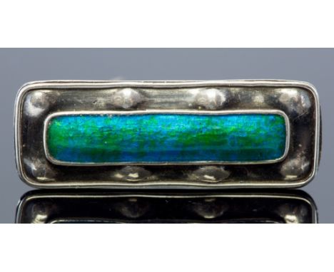 Charles Horner, an Arts and Crafts enamelled silver brooch, rectangular form with green and turquoise enamel to the centre, w