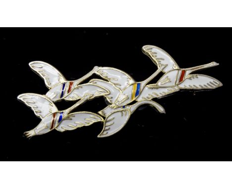 Erik Magnussen, a Danish silver gilt and enamelled brooch, in the form of a flock of geese, white enamel with multi coloured 