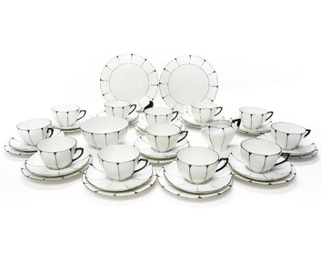 A Czechoslovakian Secessionist tea set by Victorian, white, octagonal section cups with black stripes, including 12 plates, c