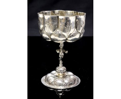 An Arts and Crafts silver chalice, Dutch, in the late 17th century style, on figural stem, import marks for Bethold Muller, C