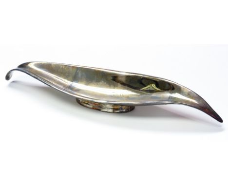 A modernist silver dish, elongated stylised leaf form with everted rim on oval ring foot, Mappin and Webb, Sheffield 1967, pa