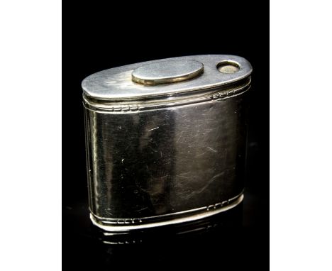 Georg Jensen, a Danish silver pill dispenser, circa 1933-44, hammered finish, shaped rectangular form, with inset borders, th