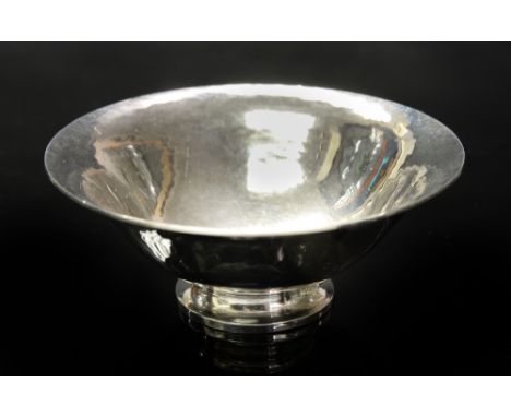 Georg Jensen, a Danish silver miniature bowl, hammered, ogee form with everted rim on splayed foot, marked 575 A, 6.5cm diame