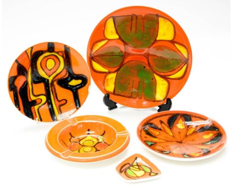 A collection of Poole Pottery Delphis plates and dishes, circa 1970s, including patterns painted by Janet Laird, Lynn Gregory