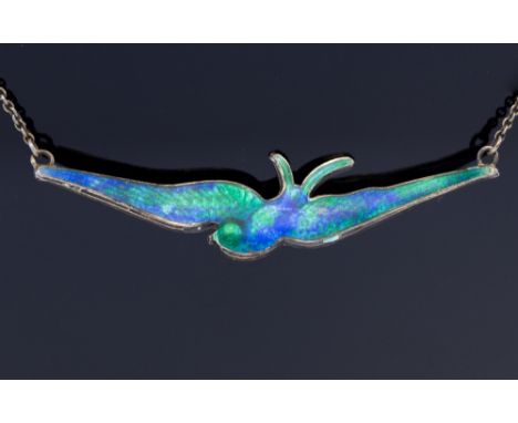 Charles Horner, an Arts and Crafts silver and enamel pendant in the form of a swallow, 5cm wide 