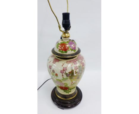 Satsuma style table lamp base on a turned wooden stand 