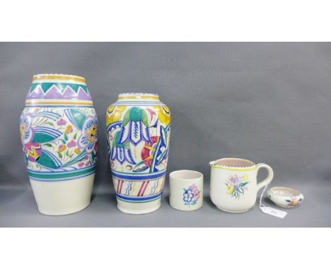 Early 20th Century Poole baluster vase painted with stylised flowers in purple, green and yellow, together with another small