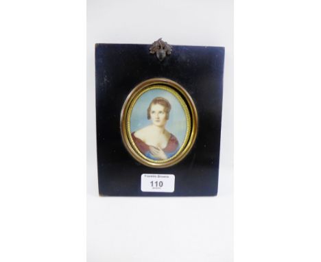 Portrait miniature of a Lady in an oval frame, 8cm