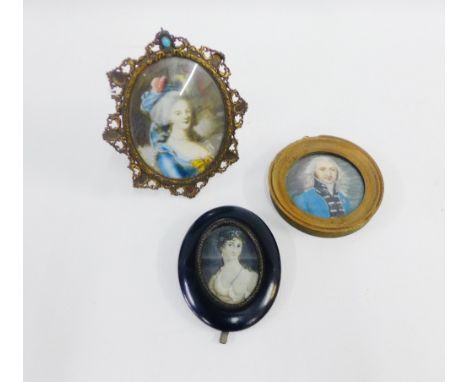 Collection of three portrait miniatures, to include one of a Gent in a Blue Jacket, framed, largest 9cm, (3) 