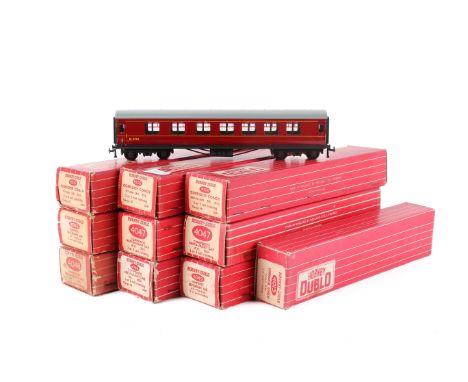 Ten boxed Hornby Dublo 00 gauge coaches. Comprising 4006 Corridor Coach (D12), 4013 Corridor Coach (D22), two 4047 Composite 