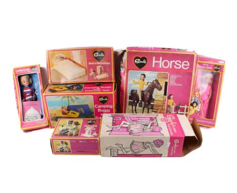 A collection of boxed Sindy Dolls and accessories. Including a Camping Buggy with Foldaway Tent, Dressing table and stool, Be