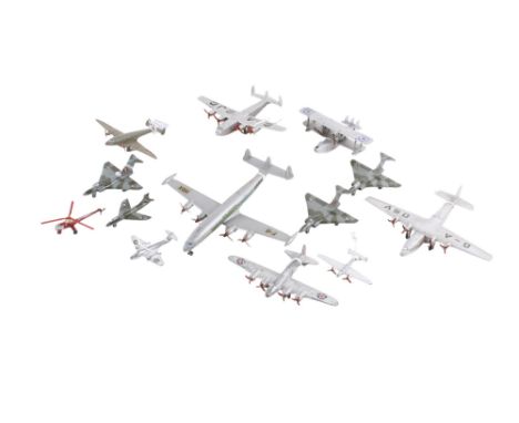 A collection of Dinky diecast aircraft. Comprising a 62P Ensign Airliner 'Explorer', 62g Long Range Bomber, 70E Meteor, 731 T