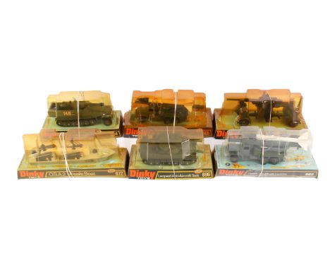 Six Dinky Toys diecast military vehicles. Comprising two 665 Honest John Missile Launchers, 694 Tank Destroyer, 672 O.S.A.2. 