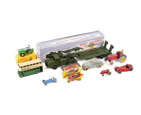 An assortment of vintage diecast. Including a boxed Dinky Supertoys 660 Tank Transporter, Dinky 290 'Dunlop' bus, Dinky 27A M