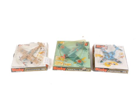 Three Dinky Toys diecast aircraft models. Comprising a 728 R.A.F. Dominie, a 739 A6M5 Zero-Sen and a 726 Messerschmitt, all i