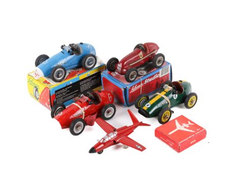 Six Schuco clockwork vehicles. Comprising two 1070 Grand Prix Racers, in red and blue. The blue example in he original box wi