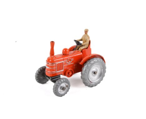 A Dinky Toys 301 'Field Marshall Tractor'. Orange body, silver trim and hubs, tan figure driver, metal tow hook