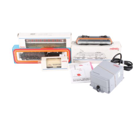 An assortment of second half 20th Century HO gauge Marklin model railway items. Including steam loco and tender 5920 #3111, S