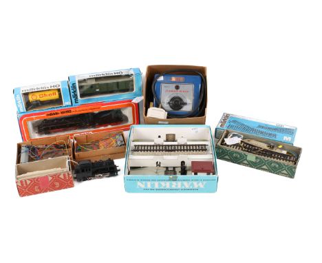 An assortment of HO gauge Marklin model railway Items. Including Level Crossing #7192, steam loco and tender Hamo #8393, 'Sup