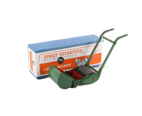 A Dinky Toys No. 751 Lawnmower. Having a green and red body, in the original box