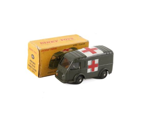 A French Dinky Toys 80F Renault Military Ambulance. Having a green body, white with red cross casting to side roof and rear d