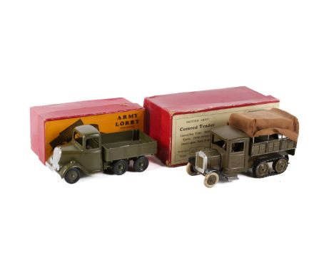 Two boxed Britains military vehicles. Comprising a No.1335 Army Lorry (with driver), painted in khaki including the hubs, a s