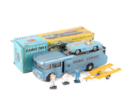 A Corgi Major 1126 'Ecurie Ecosse Racing Car Transporter' and accessories. Light metallic blue with red lettering, spun hubs,