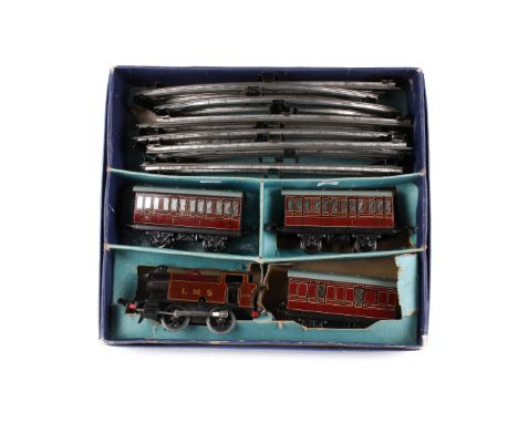 A Meccano Hornby 0 gauge LMS 2270 clockwork model train set. Comprising a 0-4-0 locomotive, three carriages and track, boxed.