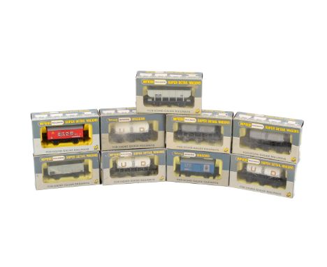 Nine Wrenn 00 gauge wagons. Including W4666 Salt Wagon 'Sifta', W4657 Milk Wagon 'United Dairies', W4655 16 Ton Mineral Wagon