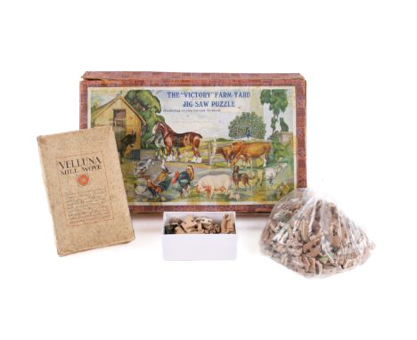 Three vintage wooden jigsaw puzzles. Including a boxed 'The "Victory" Farm-Yard Jig-saw Puzzle', in the original box, all unc