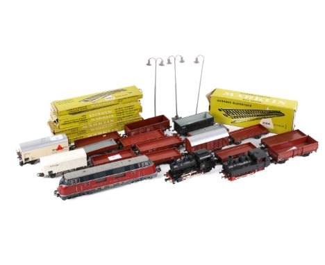An assortment of HO gauge Marklin model railway items. Including 'Deutsche Bundesbahn' electric locomotive, a tank engine, lo