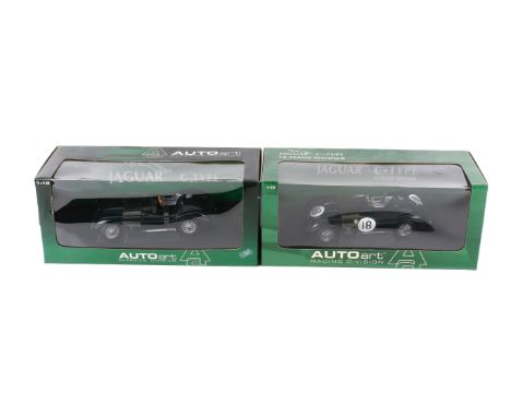 Two AutoArt Classics Division 1:18 scale diecast cars. Comprising a Jaguar C Type and a Jaguar C Typpe Le Mans Winner, in the