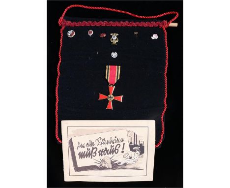 World War Two Third Reich propaganda cartoon booklet from the Armaments Ministry, together with a felt banner with a cross of