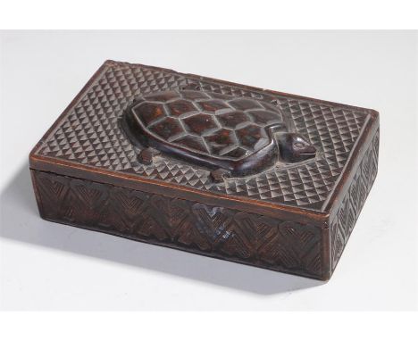 Ethnographical box, carved with a turtle to the top and a chip carved surround, 20.5cm long