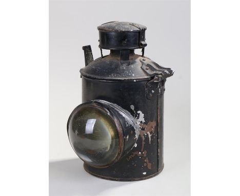 Black painted railway lamp with magnifying lens and hinged lid