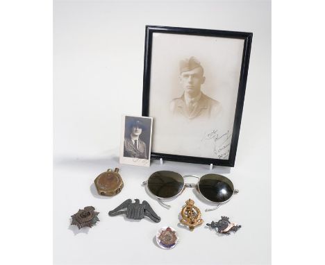 Collection of militaria to include Army Service Corps cap badge, Royal Army Medical Corps cap badge, American Field Service b