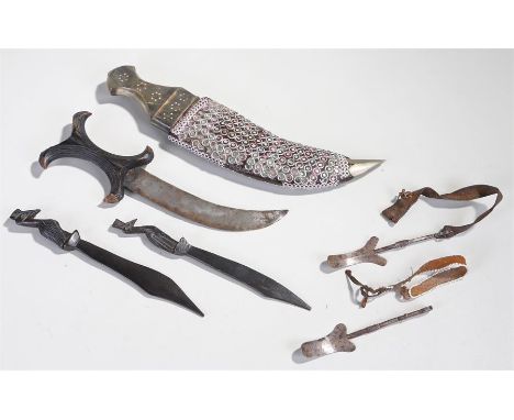 Mixed lot to include a horn handled Indian dagger decorated scabbard with squares of mirrors, a late 19th Century dagger with